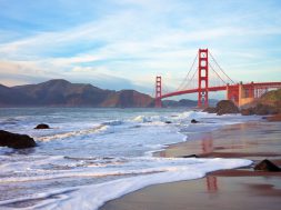 Golden Gate bridge at sunset seen from Marshall Beach, San Francisco.