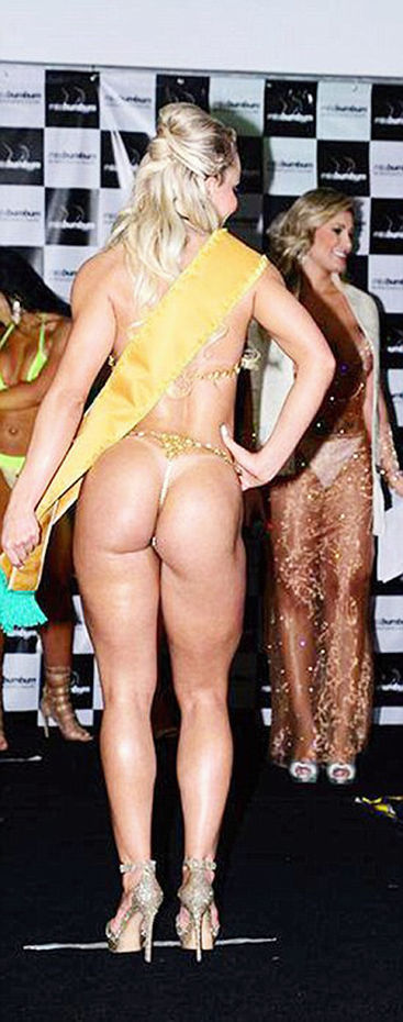 Pic shows: Indianara Carvalho who shot to fame after she won Miss Bumbum 2014 has had surgery to return her to being a virgin. A blonde Brazilian model who shot to fame after she won Miss Bumbum 2014 just as the Kim Kardashian pictures put big backsides back in fashion has had surgery to return her to being a virgin so she can once again enjoy her first time with "someone special". Shortly after model Indianara Carvalho, 22, won the bottom beauty contest Miss Bumbum 2014 her career really took off after the world became obsessed with large backsides, flying all over the world to take part in photo shoots. She only recently for example returned from the resort region Punta Cana, in the eastern Dominican Republic province of La Altagracia, part of the photo shoot for a magazine. But the model, from the state of Santa Catarina, in southern Brazil, also revealed that before setting off, she had booked for plastic surgery to have "vaginal rejuvenation surgery" in order to "recover" her virginity. She said: "I wanted to undergo surgery to reconstruct my virginity (Hymenoplasty) before I have new photographs done. I wouldn't feel good about appearing naked if I wasn't exactly as I came into the world if you know what I mean. I think I also want to give a bit of respect and new concept to the Miss Bumbum title by being a virgin." Carvalho also said she plans to give up sex for a while and to remain a virgin as she waits for somebody special to come along. The 2014 contest was marred by scandal after it was alleged by those who did not win the title that Indianara had bribed the judges with over 70,000 GBP in cash to make sure that she won the award. Claudia Alende, better known as the Brazilian "Megan Fox", won second place in the competition even though she was a clear favourite among the audience. The magazine publishing the photoshoot with the virgin Miss Bumbum is being released for sale on Christmas Day. (ends)