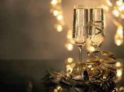 close-up-of-two-flute-glasses-filled-with-sparkling-wine-3036525