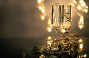 close-up-of-two-flute-glasses-filled-with-sparkling-wine-3036525
