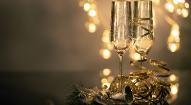 close-up-of-two-flute-glasses-filled-with-sparkling-wine-3036525