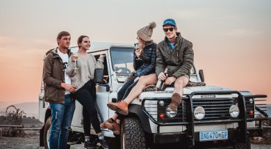 photo-of-people-on-a-white-suv-2590596