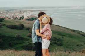 photo-of-woman-and-man-hugging-while-standing-on-grass-1391480