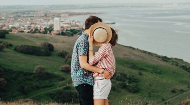 photo-of-woman-and-man-hugging-while-standing-on-grass-1391480