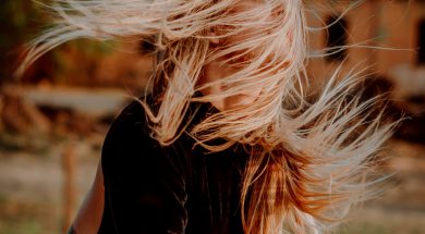 woman-wearing-black-top-1938332