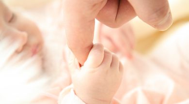 baby-holding-person-s-index-finger-64242