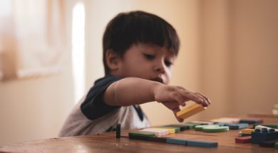 boy-holding-block-toy-1598122