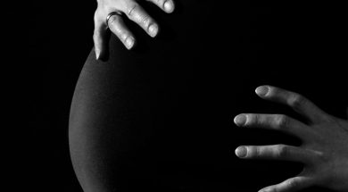 gray-scale-photo-of-a-pregnant-woman-46207