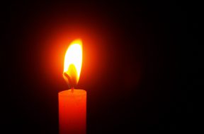 red-lighted-candle-220618