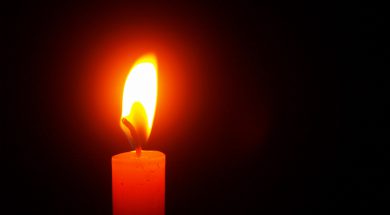 red-lighted-candle-220618