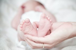 close-up-of-hands-holding-baby-feet-325690