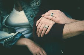 man-and-woman-couple-wearing-their-silver-couple-bond-ring-121848