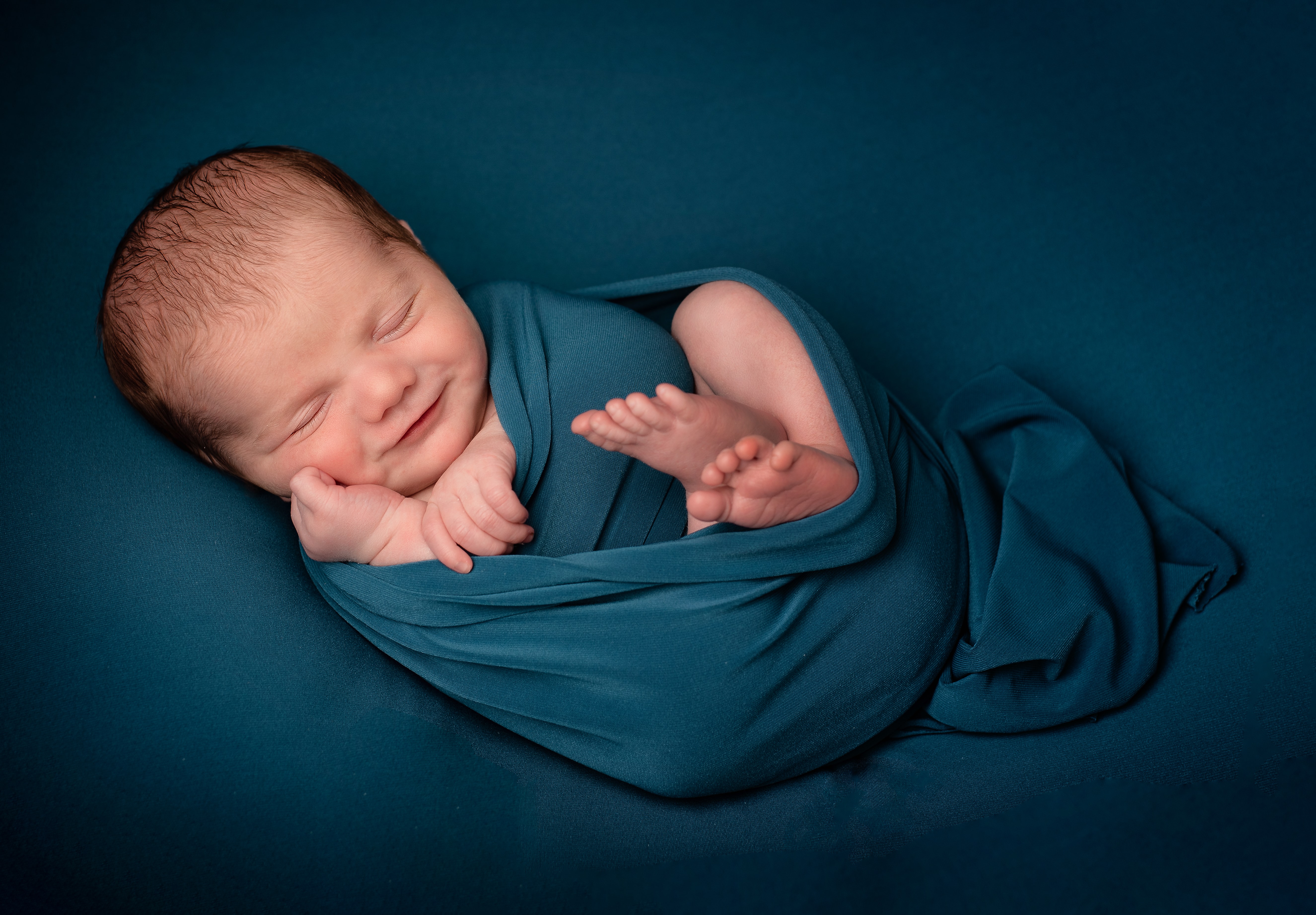 Zbulohet arsyeja, ja pse bebet buzëqeshin ndërsa flenë